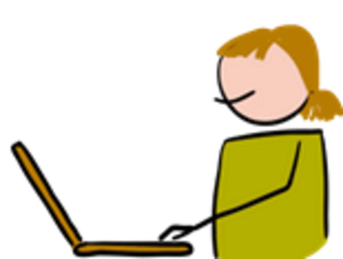 Männchen sitzt vor Laptop